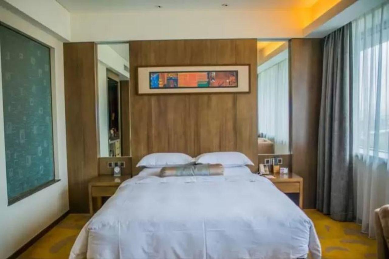 Gleetour Maya Hotel Ухан Екстериор снимка
