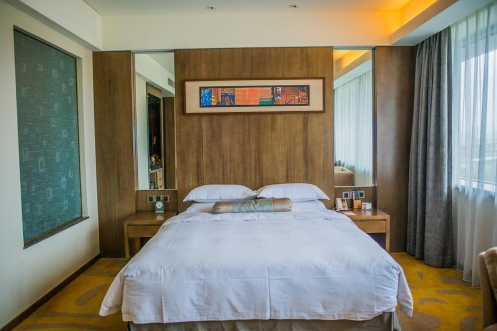 Gleetour Maya Hotel Ухан Екстериор снимка