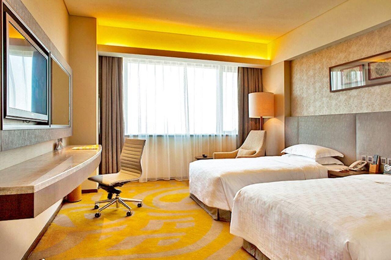 Gleetour Maya Hotel Ухан Екстериор снимка