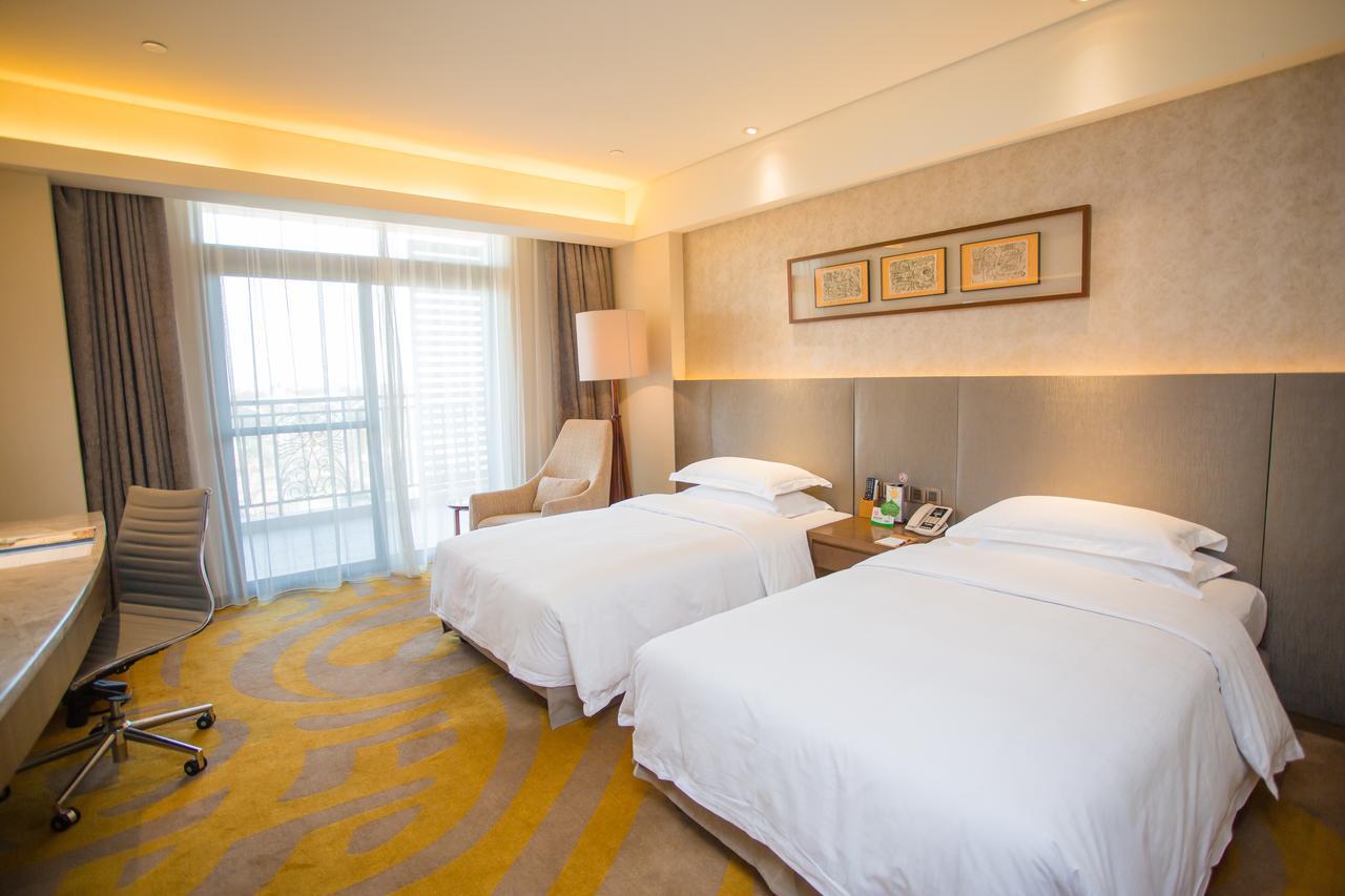 Gleetour Maya Hotel Ухан Екстериор снимка