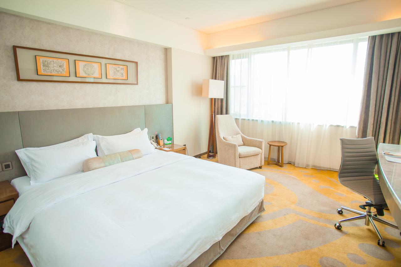 Gleetour Maya Hotel Ухан Екстериор снимка